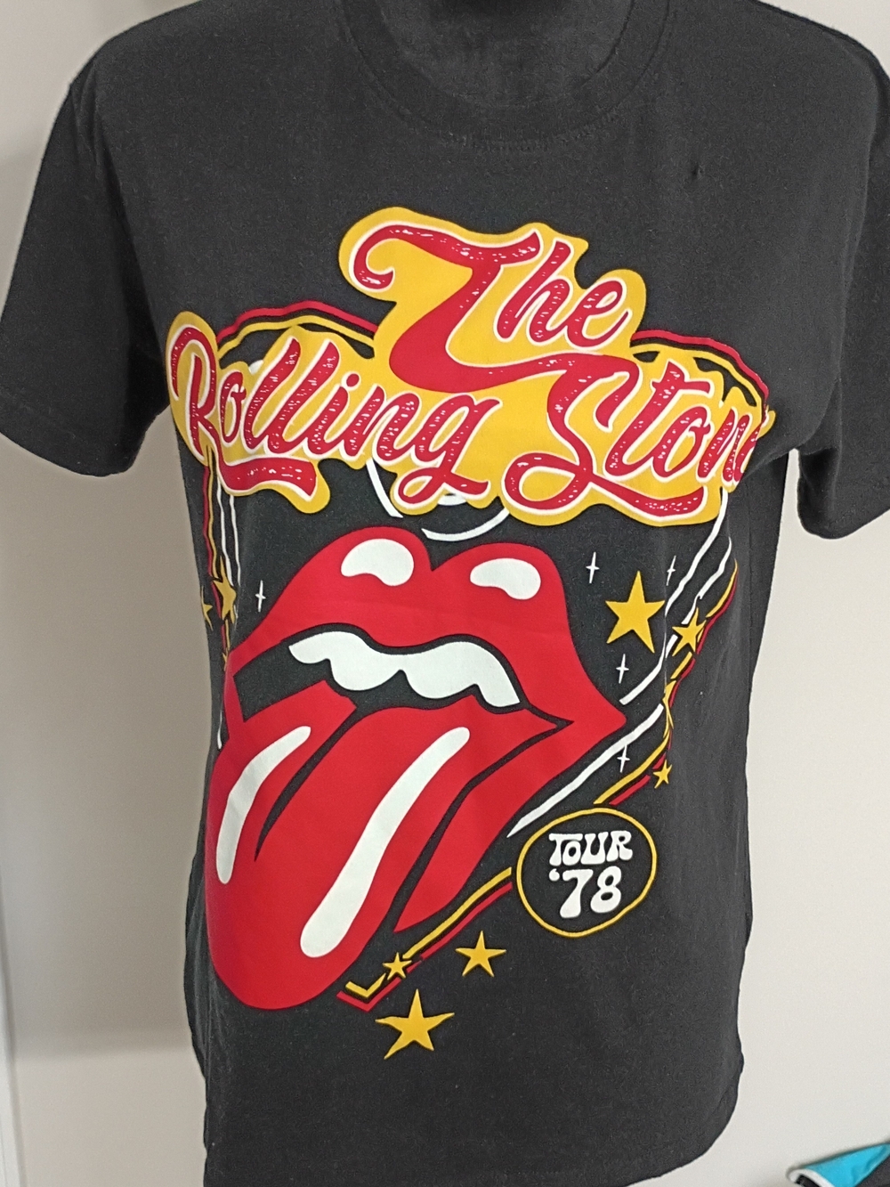 the Rolling Stones Kids Black Tee with Red Tongue & Yellow Script